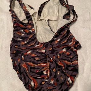Slightly used multi color brown/black/orange one piece swimsuit.